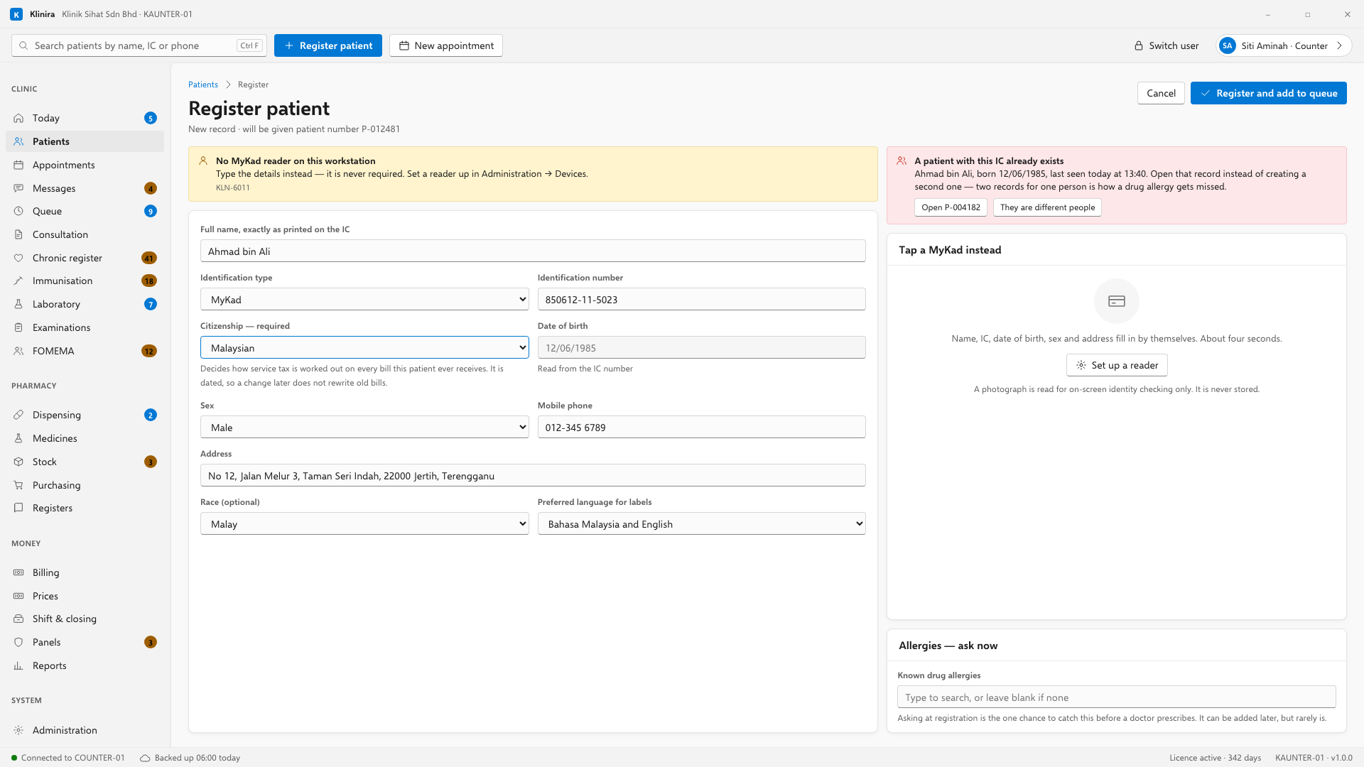 Registration. Tap the MyKad reader if you have one; otherwise type. The duplicate check runs by itself as you leave each of the three fields that identify somebody.